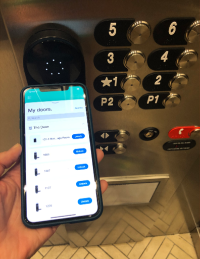 The app’s list of doors with Unlock buttons beside an elevator reader